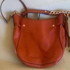 Crossbody with two straps gold hardware.